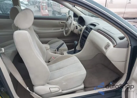 1999 Toyota Camry Solara Se V6 z USA, uszkodzony, nr VIN 2T1CF28P4XC260362